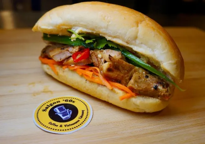 Freshly-toasted baguette stuffed w/ cucumber, coriander, pickle carrot & daikon and Your choice of Proteins: